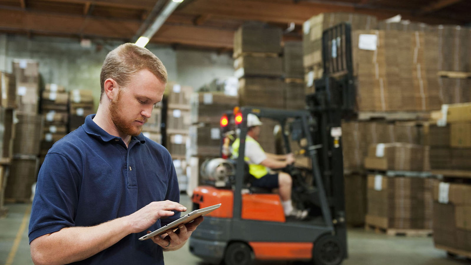 Factory worker with tablet